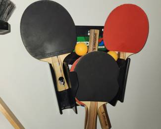 ping pong paddles, balls, nets...