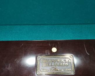 Full sized pool table by Brunswick Billiards,  w ping pong top. AVAILABLE FOR PRE-SALE