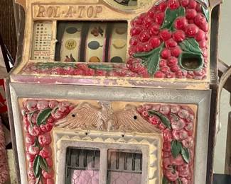 Nickle Watling Cherry Front Rol-A-Top Slot Machine - restored and in working order. Plays and Pays.