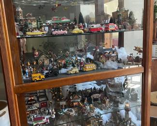 Large display of Department 56 buildings, people and accessories.  