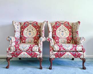 PAIR OF VINTAGE MAHOGANY BALL & CLAWFOOT WINGBACK CHAIRS - RED FLOURISH MEDALLION UPHOLSTERY
