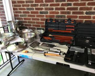 Sets of utensils on the screened in porch