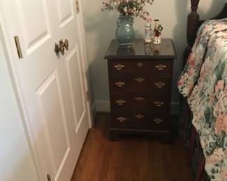 one of a pair of bedside chests