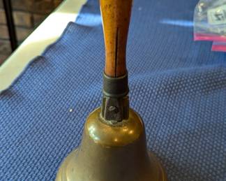 Brass bell with wood handle