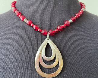 Red Faceted Beaded Necklace with Silver Spacer Beads and Teardrop Pendant