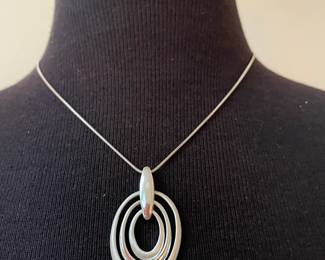  Silver Necklace with Three Nested Oval Rings of Increasing Size