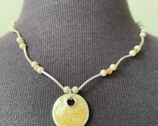 Beige Beaded Necklance with Swirled Yellow Round Pendant