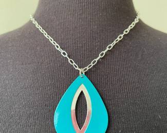  Silver Necklace with Teardrop Turqoise Pendant with open Almond Center