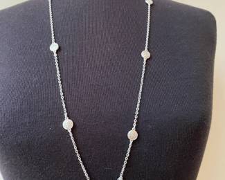Long Silver Necklance with a Filigree Balls Evenly Spaced within Necklace