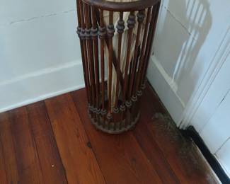 Stick and ball design wood umbrella stand, circa 1890