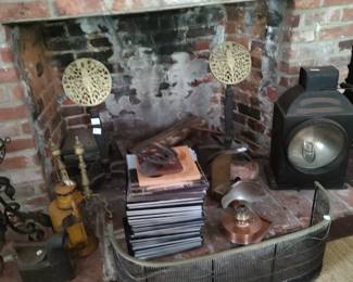 Various fire utensils and antique lanterns.