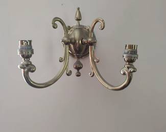 One of four cast brass wall sconces, late 19th/early 20th century.