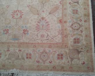 Handmade wool rug of approximately 6 by 9 feet plus, late 20th century 