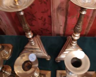 Pair of tall pricket sticks with triangular bases resting on ball feet, 19th century, European origin