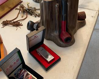 Zippo lighter. Pipe lighter pipe stand with pipes 