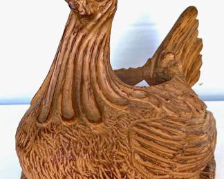 Carved hen holder