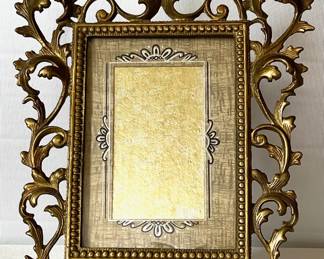 Ornate brass frame