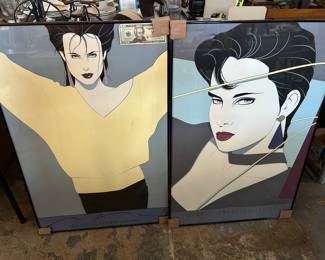 Here are 2 Patrick Nagel Serigraghs. Both have an estimated Edition size of 5,000. The one on the left is his Commemorative #8 aka "Yellow Sweater" with a release date of April 1986. The one on the right is his Commemorative #11 "Purple Sweater and choker". Release date was early 1987. Both have an edition size of about 5,000 and are framed in black metal w/ UV glass.