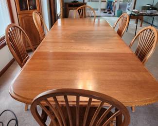 large extendable dining table with 6 chairs