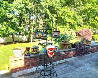 Wrought iron plant stand and plant pots