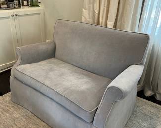 pair of gray velvet loveseats