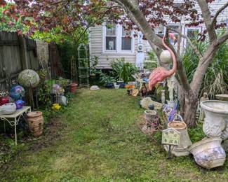 Plenty of yard decor, garden pots, plant stands, trellises etc