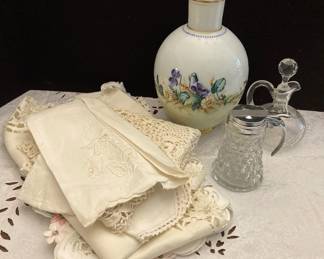 Handpainted Floral Vase, Crystal Cruet And Table Linens