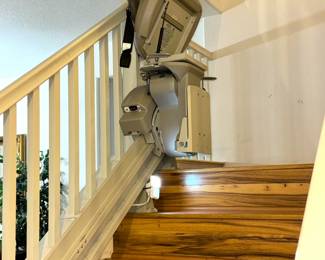 Dual chair elevator lift with tracks