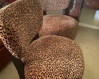 Gorgeous vintage style animal print chairs. 