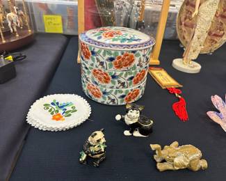 The panda, elephant and cat open to hold rings, etc.