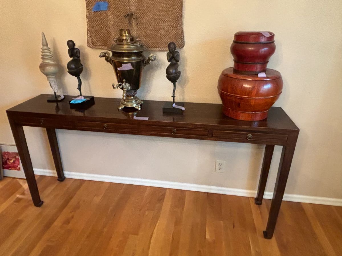 $1200. Beautiful Ju Mu wood console table with four drawers.  Originally $2300.  69"w x 14"d x 32"h.  Great size! 
Closer view of the beautiful wood in the next photo.  Items on top available during in-person shopping starting Friday. ]