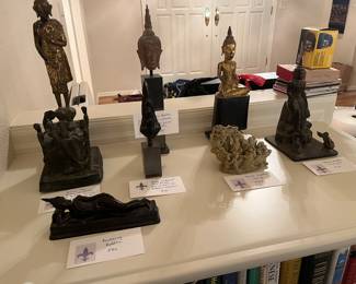 Collection of Buddhas for sale during in-person shopping Friday and Saturday unless featured with a price.