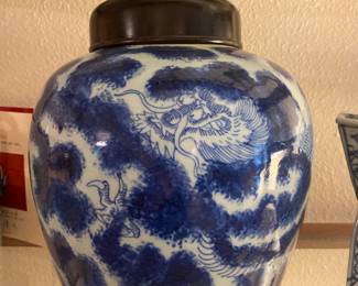 $320. Blue and white Chinese lidded jar with a motif of dragons hidden amongst clouds. 9.5" diam. x 10"h.