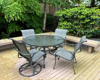 $360. Tropitone table with four chairs. Two chairs swivel two do not. Originally $1200 for the set. 40"inch table