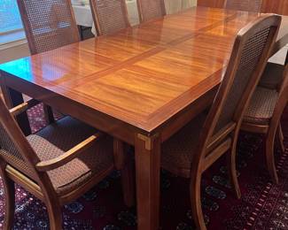 Another view of the table showing brass detailing on the corners.