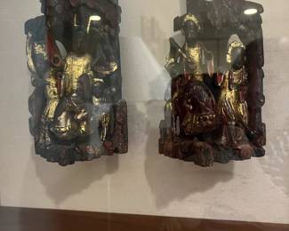 Framed in a shadow box carved temple remnants for sale during in-person shopping Friday and Saturday.