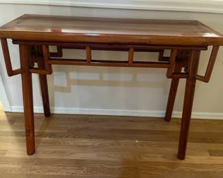 $320. Asian Wine table antique that was used to serve wine during festivals, important occasions, and display objects of beauty. Has a floating top. 40"w x 14"d x 32.5"h.