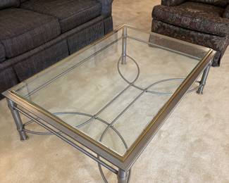 $130. Glass and metal two toned coffee table. 48"w x 32"d x 16"h.