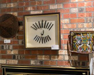 $200. Framed carved wooden figures from a Malaysian Shaman's necklace.