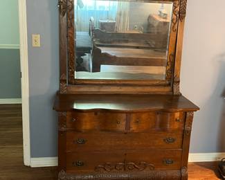 $1350 Victorian dresser 28 X 21 X 82 together with dry sink towel holder 36 X 17 X 80 with swivel mirror - Unusual face carving on apron. A rare set. 