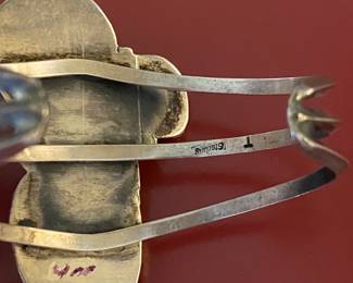 $200 - Navajo bracelet cup 2 1/2 inches diameter 3 large turquoise stones. 