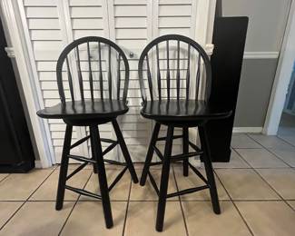 $100 pair of swivel high top ladder back chairs