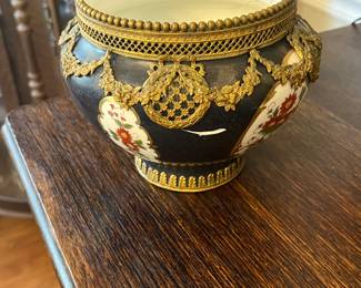 $60 Porcelain floral planter with bronze ormolu has hairline crack 5 x 5 1/2