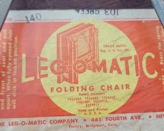bottom of green folding chair