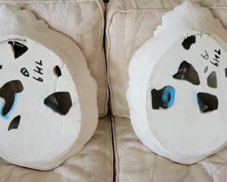 back of chalk ware plaques