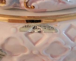 signature on cherub lamp