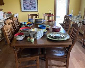 Amish made oak table 8 chairs. I believe the picture is showing with 2 leaves in the table. 