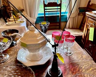 see that metal thing front and center ??? It’s an antique wind up shoo-fly, or fly fan, to keep flys off the dining table and food. 