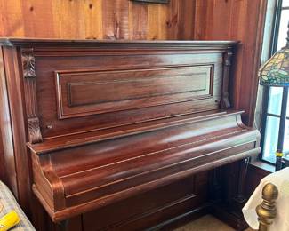 This antique Hobart M. Cable Co. upright mahogany piano is over 100 years old and was obtained by the homeowner in the 1970's from a bar in Daytona Beach. $450