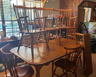 Ethan Allen dining table w/2 - 12" leaves and 6 Ethan Allen Windsor chairs. Table measures 60" x 39" x 28" without the leaves.  $550